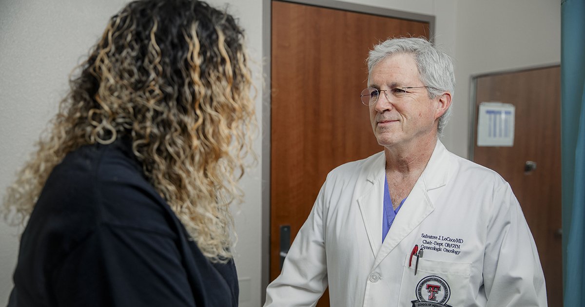 Dr. LoCoco consults with a patient.