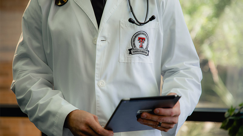 Provider looking at tablet